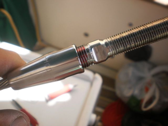 Add a little bit of red thread-locking compound to the threads of whatever end piece you're using (this is a stud), and screw it into the ferrule.